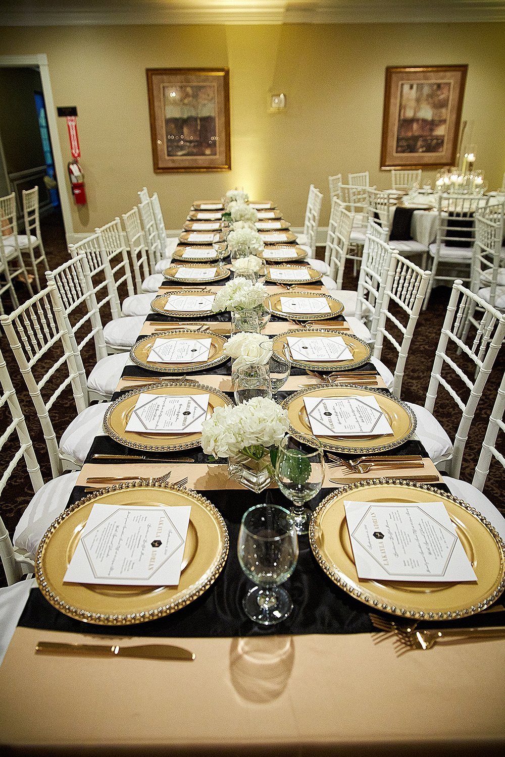 gold charger plates for reception decor at country club venue