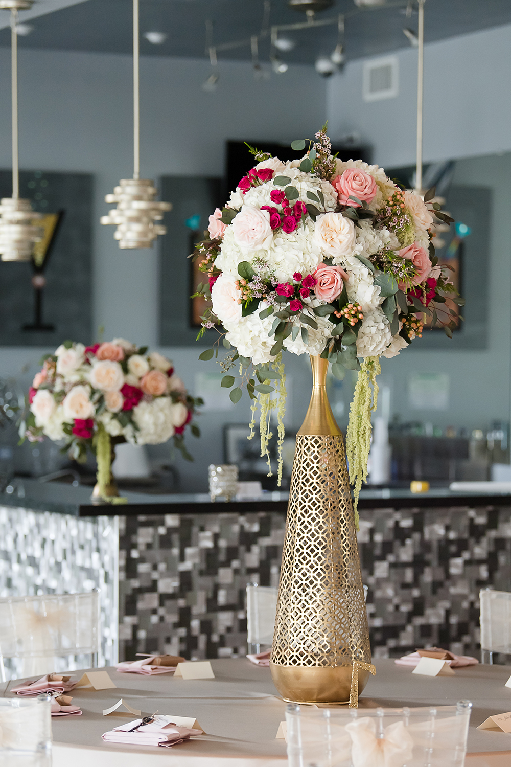 gorgeous bouquet centerpieces with gold vase