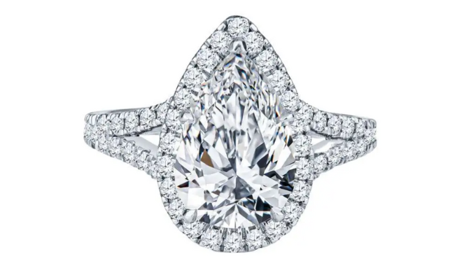 Pear-shaped diamond halo engagement ring. 