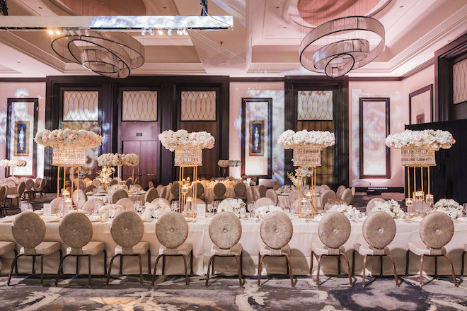 The ballroom at The Post Oak Hotel at Uptown Houston decorated with cream and blush wedding decor. 
