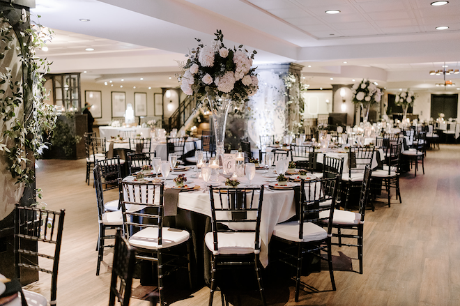 Black and white wedding decor in the ballroom of Magnolia Hotel Houston. 