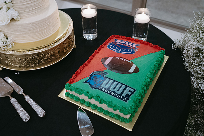 The groom's cake split between a Florida Atlantic University and University West Florida logos. 