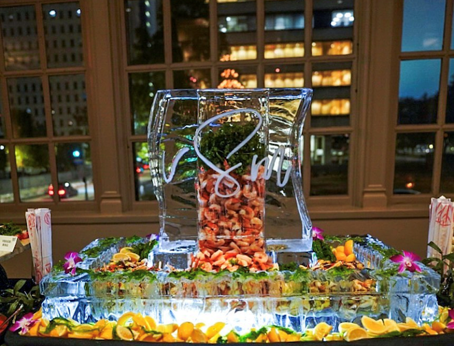 At the Corinthian Houston an ice sculpture and shrimp from Masraff's Catering are on display.