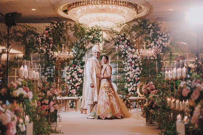 The bride and groom wed with a traditional Indian wedding at The Westin Galleria Houston.