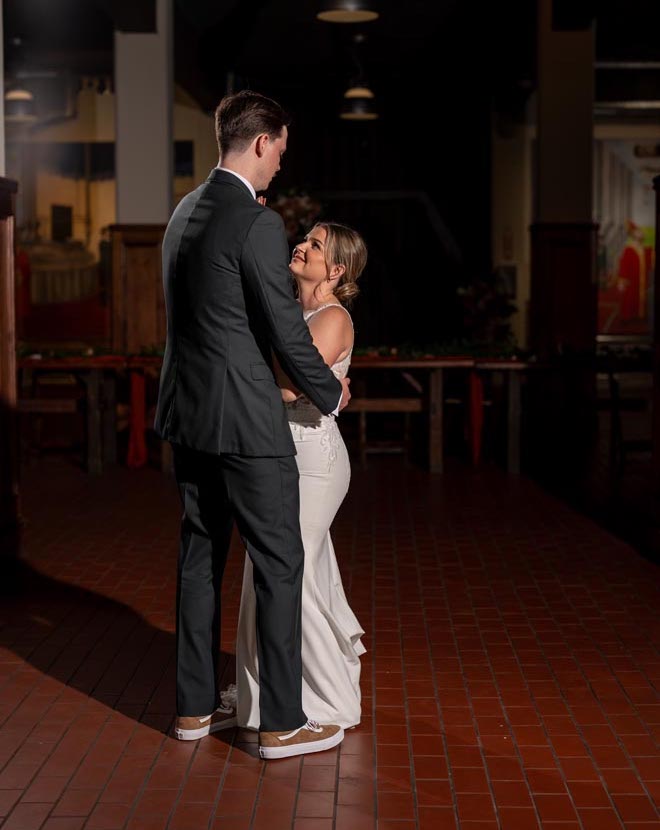 The bride and groom share a private last dance before concluding their intimate wedding celebration.