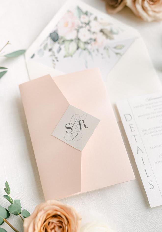 Light pink and floral wedding stationery and invitations.