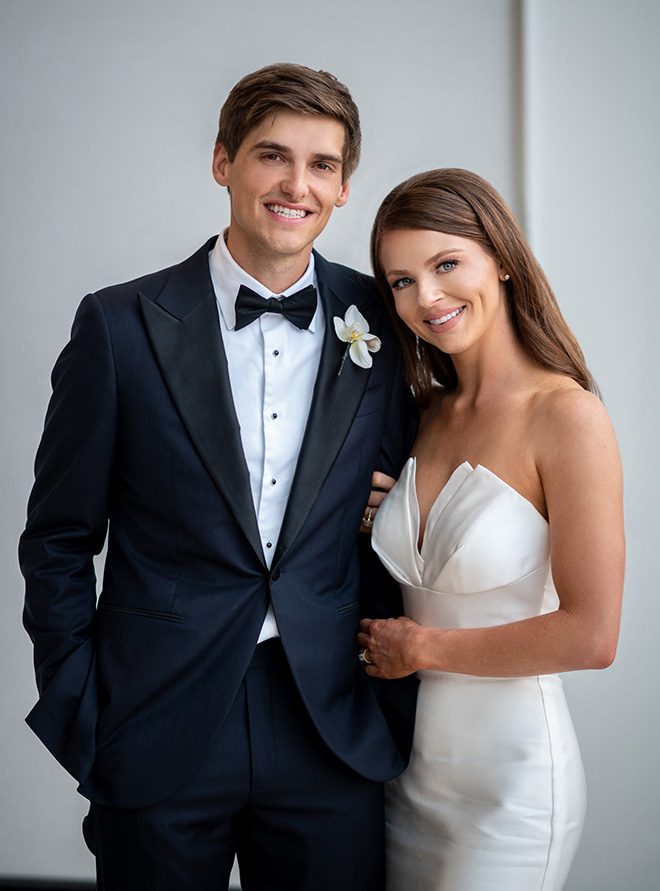 The bride and groom smile at their wedding venue in Houston, The Post Oak Hotel at Uptown Houston.