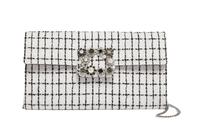 Plaid black and white clutch with a jewel buckle. 
