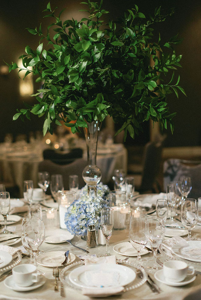 Greenery and blue hydrangeas detail the tablescapes in the JW Marriott Houston by The Galleria.