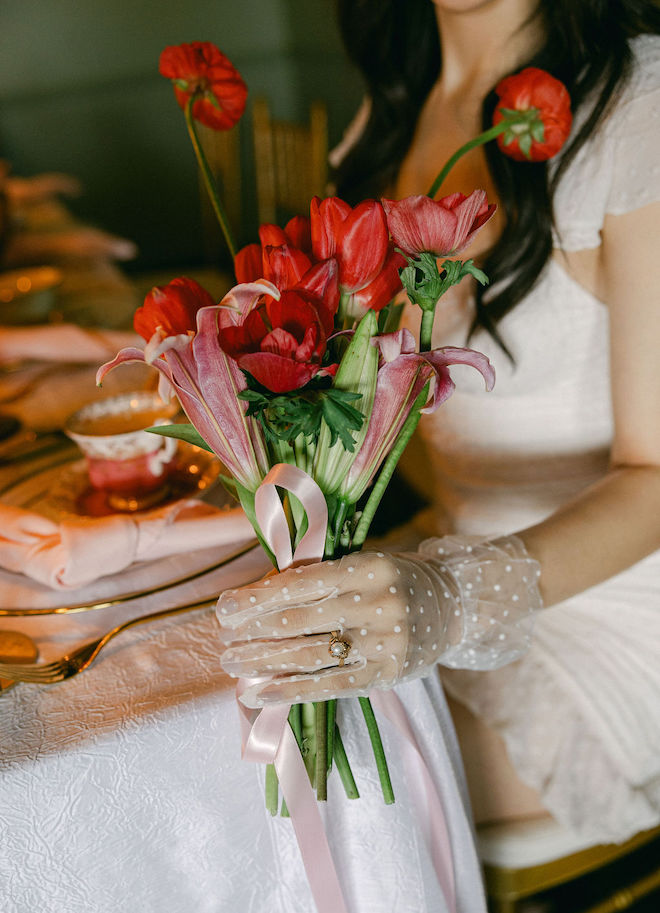 A bouquet of dainty red florals. 