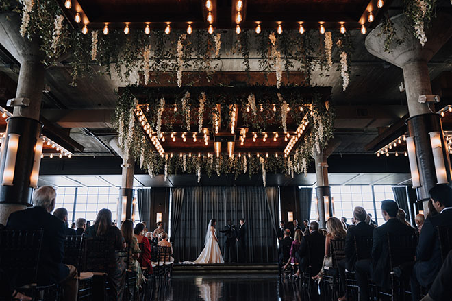 The bride and groom wed with a neutral-toned wedding. 