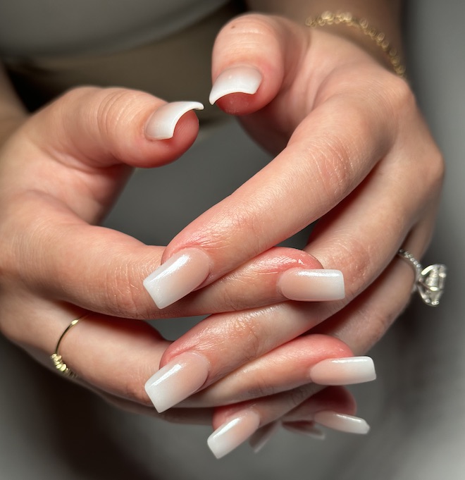 Milano Nail Spa The Heights designs a french ombre manicure with a chrome finishing for bridal nails.