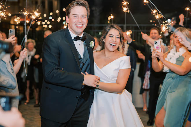 The bride and groom end the night with a sparkler send-off. 