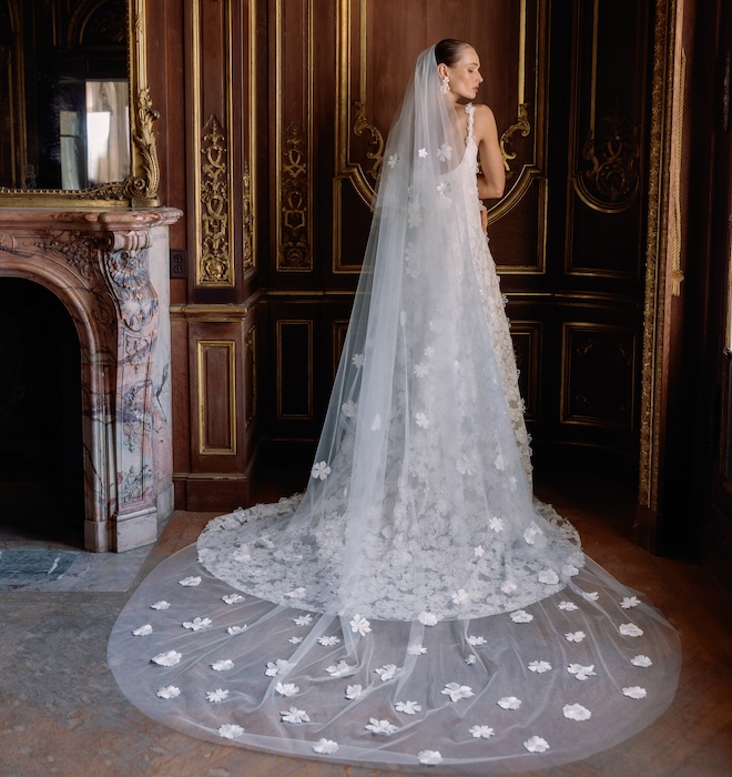 Cathedral-length veil with 3D floral embellishments. 