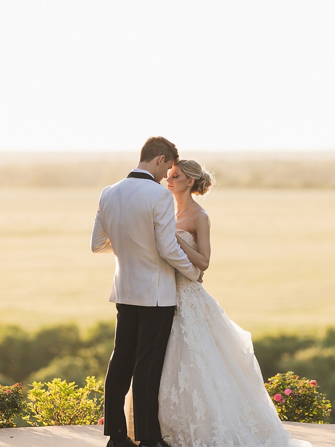 The bride and groom wed with a countryside wedding in Bastrop, Texas.