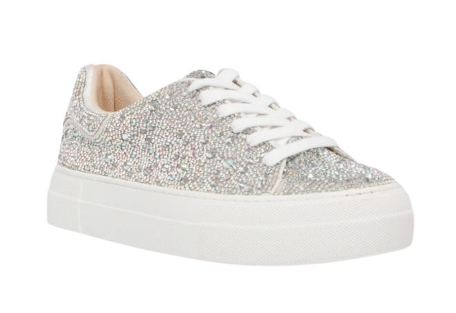 White and silver sparkle sneakers for a after-party wedding reception. 