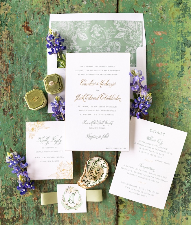 White, black and gold stationery with green detailing from Bering's.