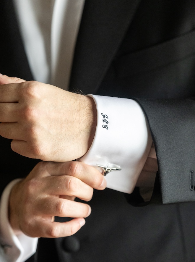 The groom's monogrammed shirt with longhorn cufflinks. 