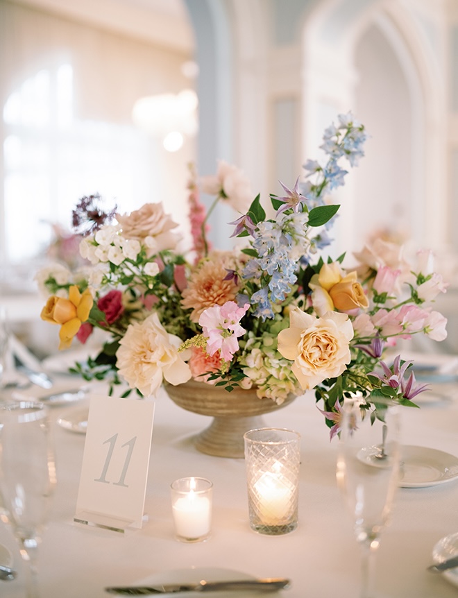 Pastel florals decorate the reception tables at the Grand Galvez.