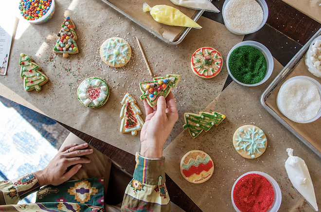 Cookies decorated for Christmas with icing and sprinkles. 