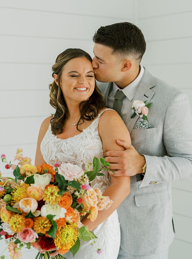 The bride and groom share a private first look before walking down the aisle. 