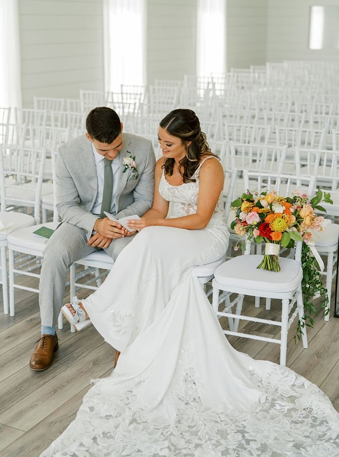 The couple share private vows before their wedding ceremony. 