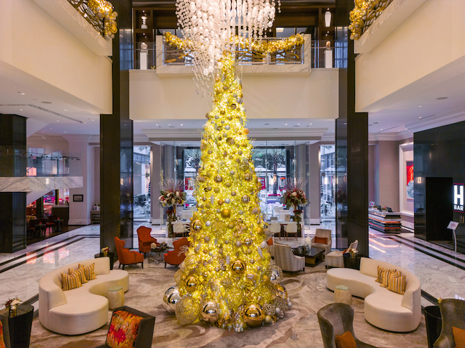 A Christmas tree in the middle of the lobby at The Post Oak Hotel at Uptown Houston.