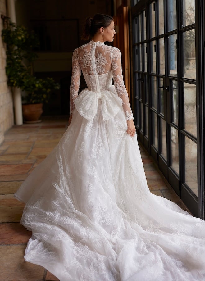 An all-lace gown with a large bow in the back. 