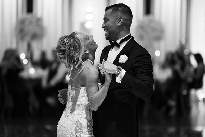 The bride and groom dance at their wedding reception.