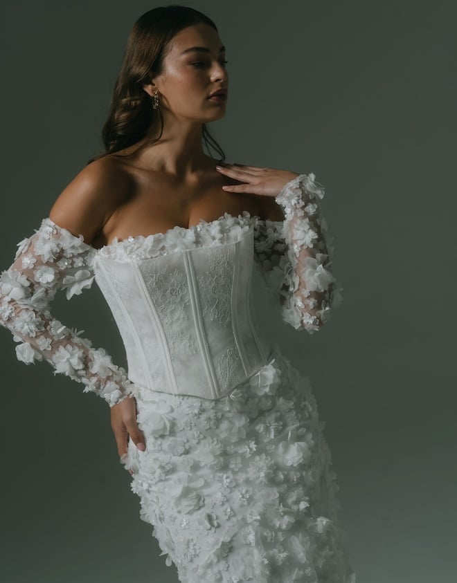 3D floral dress with a white-lace corset. 