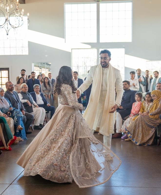 The bride and groom dancing at their reception. 