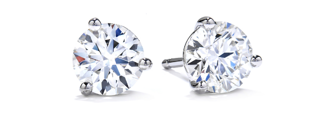 Three prong diamond studs. 