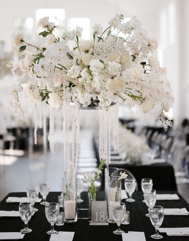 A centerpiece full of white florals. 