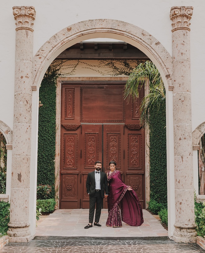 The bride and groom take their engagement photos at The Bell Tower on 34th in Houston. 