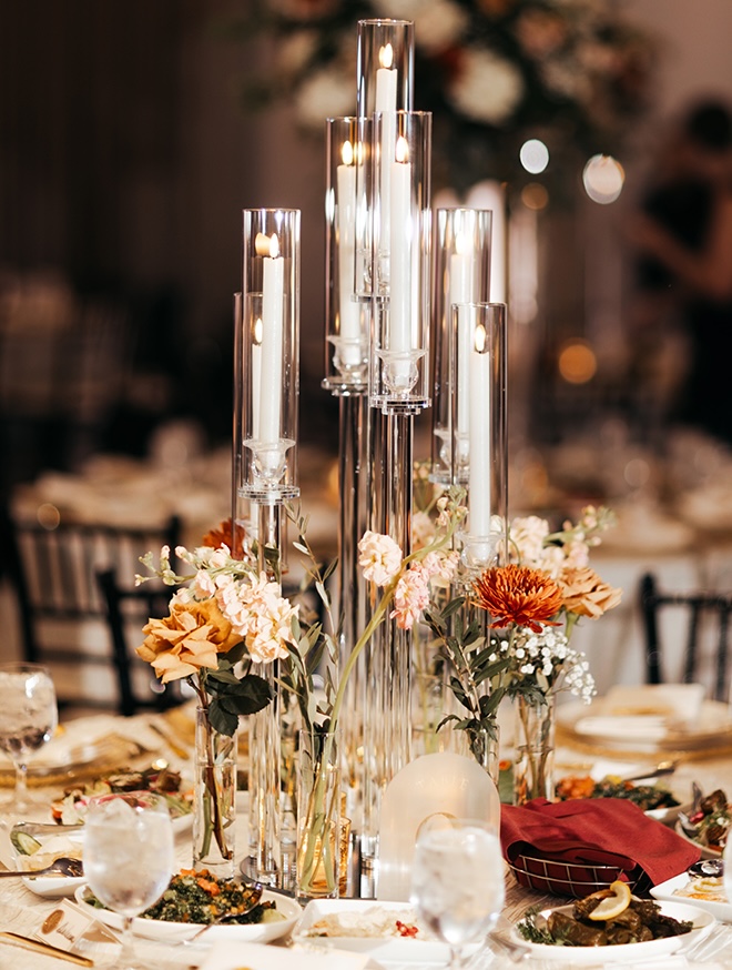 The bride and groom celebrate their marriage with a romantic fall wedding reception. 