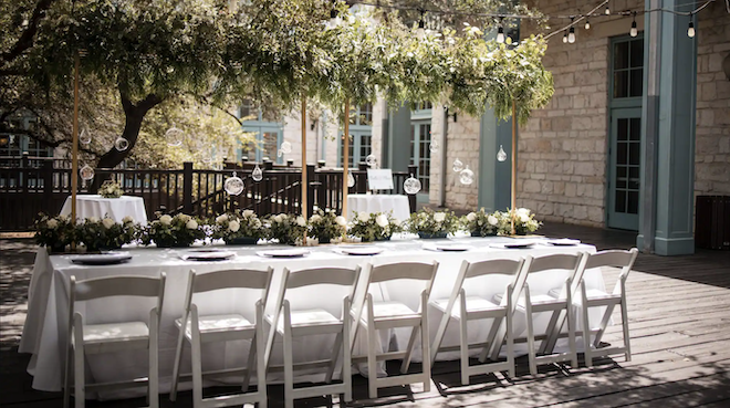 A reception table on the patio of The Hill Country Resort and Spa. 