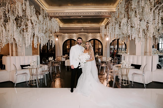 The couple have a chic Houston wedding celebration at Le Tesserae. 