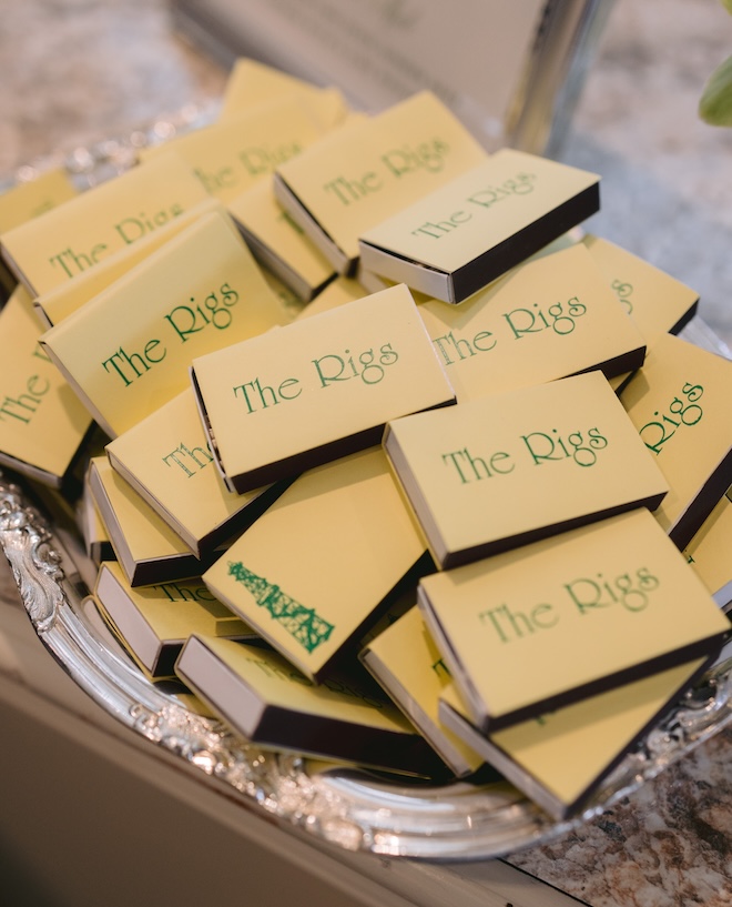 Yellow match boxes that say "The Rigs" in green. 