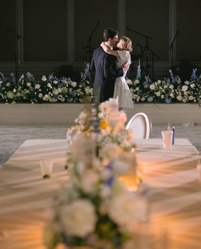 The bride and groom kissing during their private last dance. 