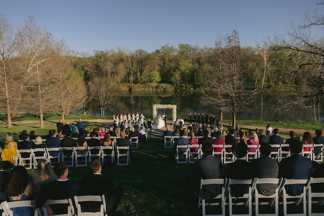 A ceremony in front of the lake at Hyatt Regency Lost Pines Resort and Spa. 