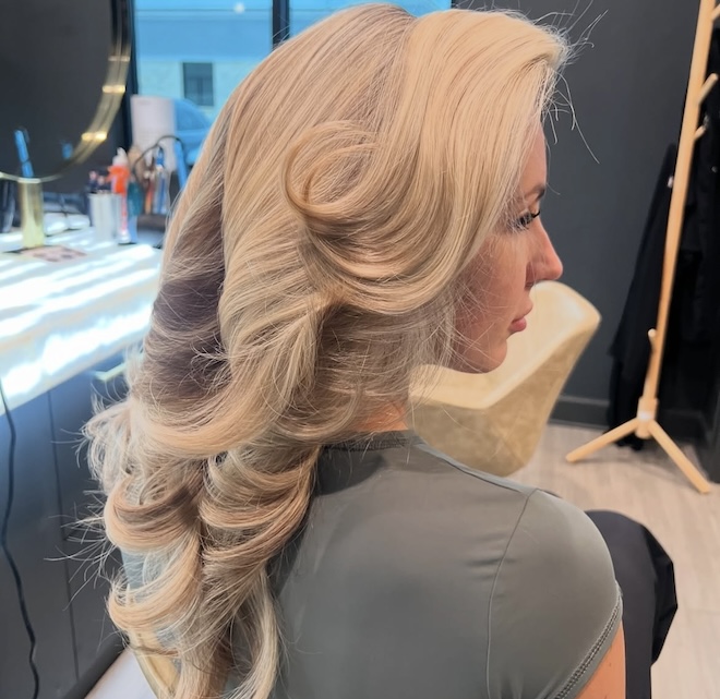 A blonde blowout with curls