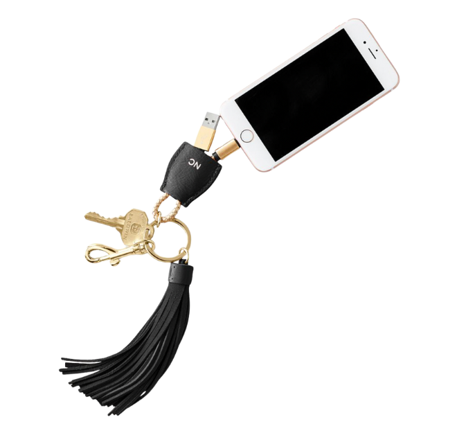 A power up lighting to USB tassel keychain from Mark & Graham is a travel accessory.