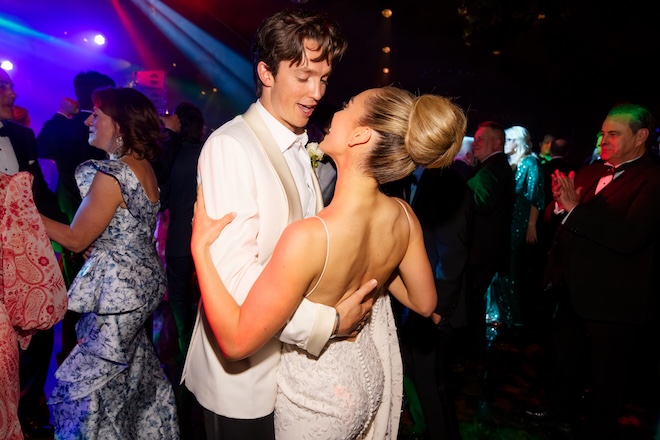 The bride and groom dance at their after party in Venice, Italy.